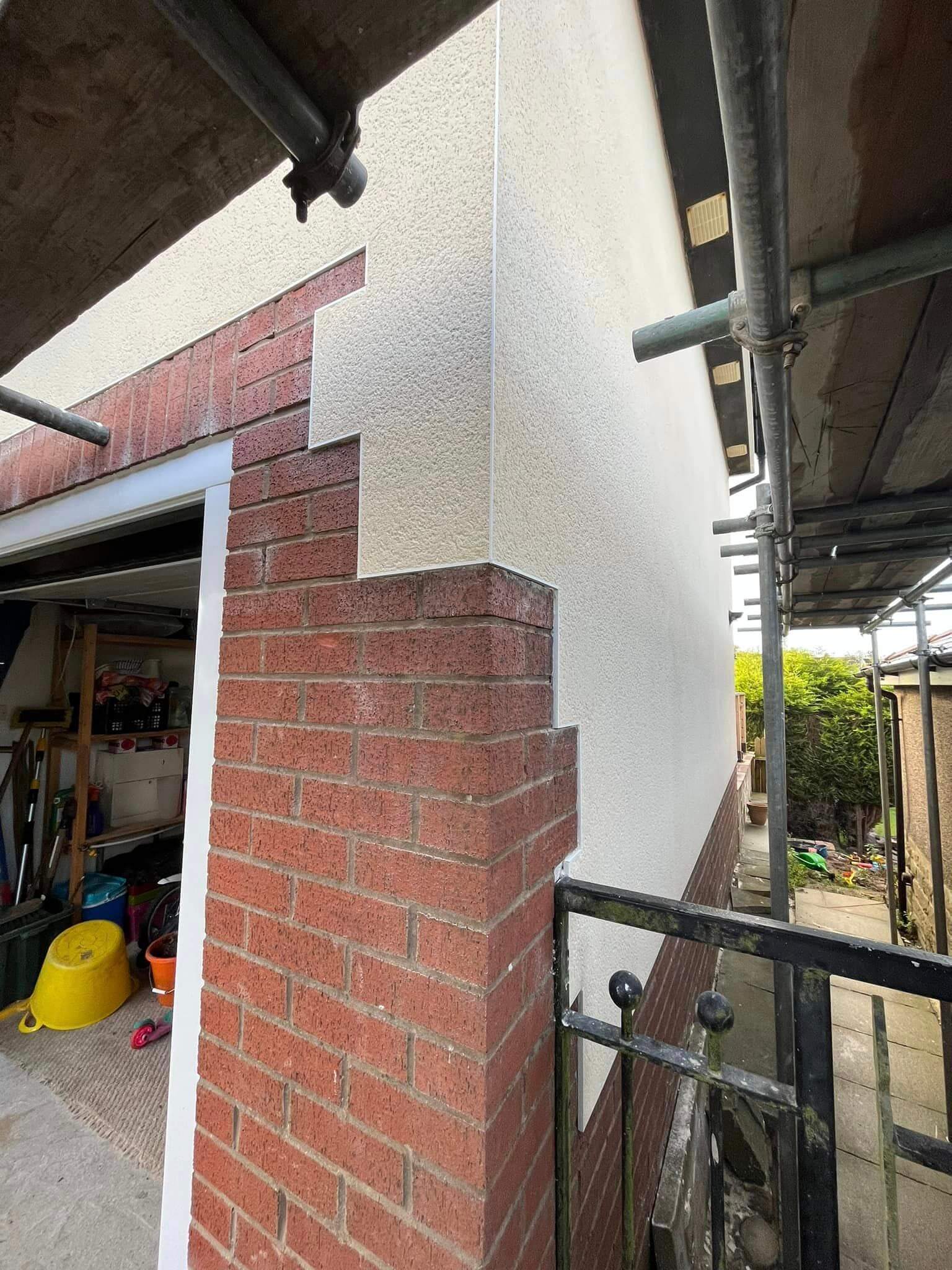 Brick and render construction